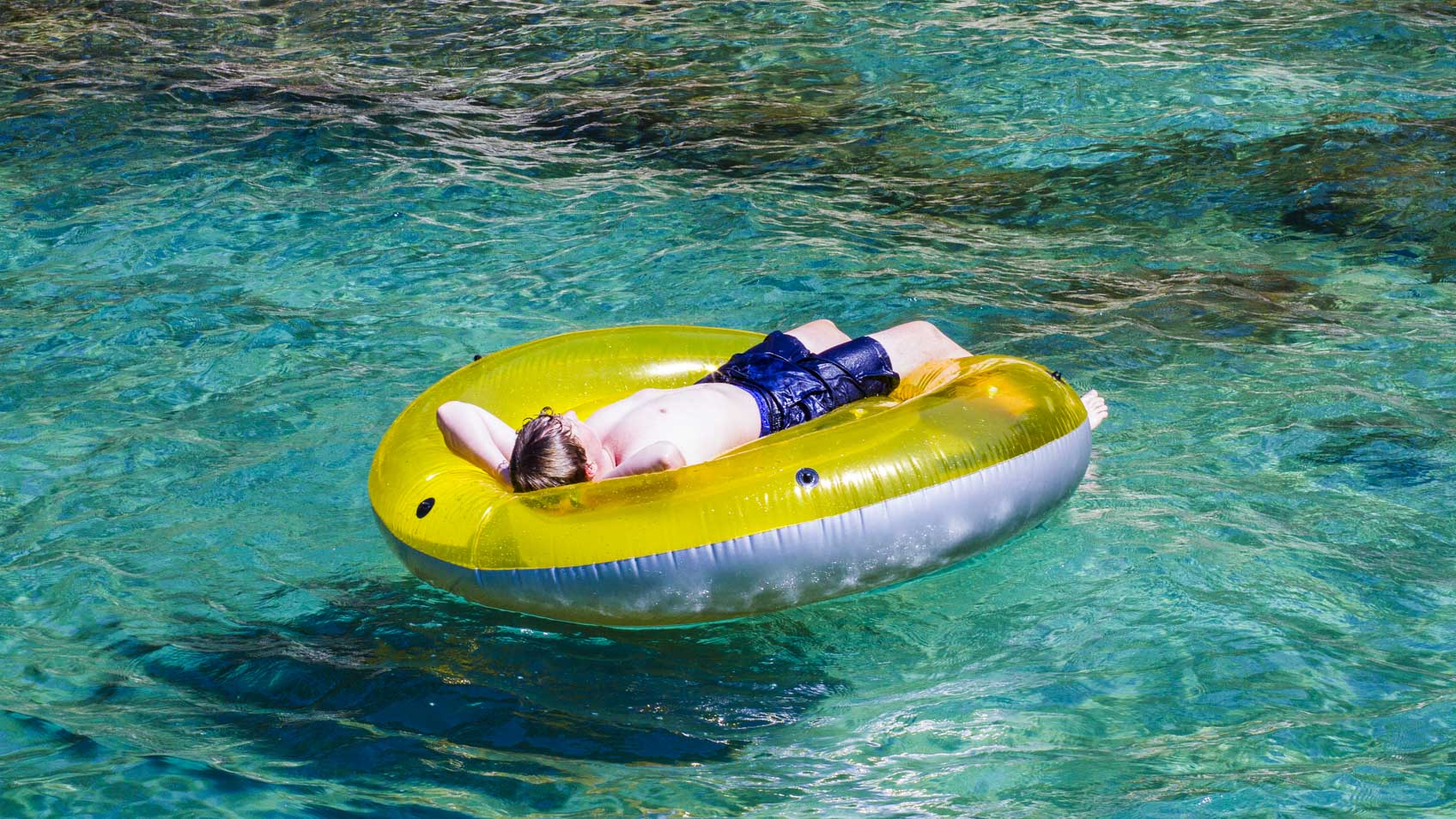 boy-relaxing-floaty